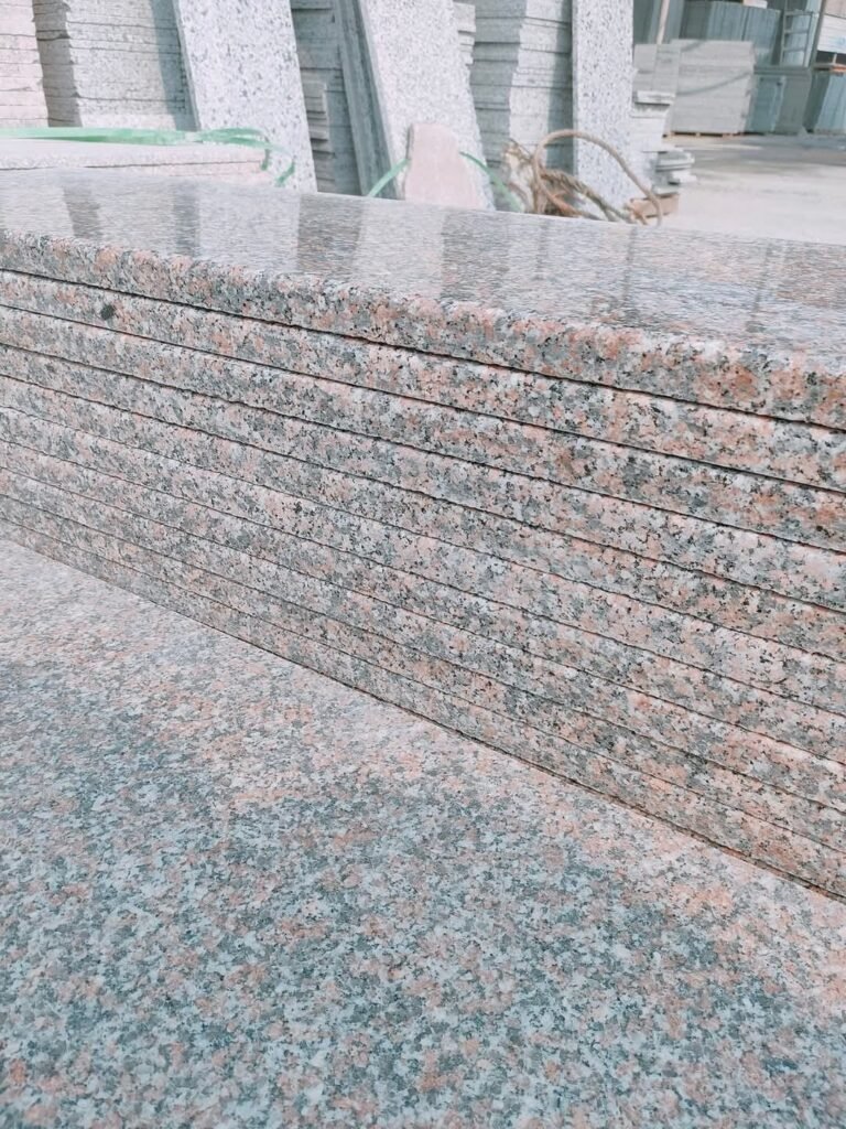 Marble Slabs in Factory – “High-quality natural marble slabs in a factory ready for cutting and polishing.”